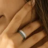 Elegant anniversary ring with a detailed mixed-stone band