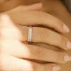 Anniversary ring featuring 19 baguette-cut and 54 round stones