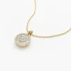 Sterling silver necklace featuring a polished disc-shaped pendant