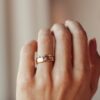 Patterned sterling silver ring with bright CZ diamond accents