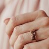 Gold plated ring with baguette stone layout and classic styling