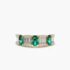 Baguette-set ring combining sparkle, texture, and green accents