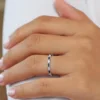 Sterling silver ring featuring bezel-set premium CZ sapphire and diamond details