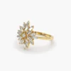 Gold-plated sterling silver ring with bright baguette and round cluster stones