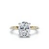 Engagement ring featuring a refined basket setting and oval stone