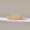 Wedding band with pave-set CZ stones and textured beading