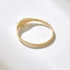 Bezel diamond pinky ring with subtle sparkle and simple form