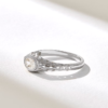 Elegant sterling silver bezel ring with oval-cut CZ centre