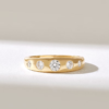 Sterling silver dome ring with bezel-set round stones