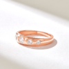 Wedding ring with a 4.87 mm wide top and round stones