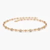 Slender sterling silver bracelet with classic migraine accents