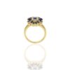 Blue and clear stone flower ring with polished gold-plated finish