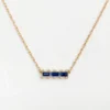 Blue sapphire bookend necklace in 925 sterling silver with diamonds