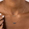 Sterling silver necklace with blue sapphire stones and diamond accents