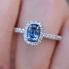 925 sterling silver ring with blue oval sapphire and CZ accents