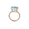 Cocktail ring featuring a blue topaz-inspired centre in polished silver