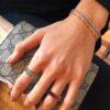 Emerald cut blue topaz eternity ring in a gold-plated setting