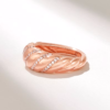 Chunky women's ring with baguette stones and polished lines