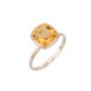 Citrine solitaire ring with bezel setting and cushion-cut stone