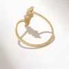 Stackable ring with a graceful cluster silhouette