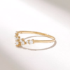 Delicate stacking ring with curved silhouette and clean finish