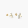 Curved sterling silver helix piercing with baguette-cut stones