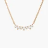 Curved sterling silver necklace with a cluster stone pendant