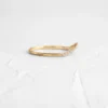 Elegant wisp band with a gently hugging curved shape