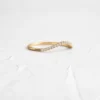 Curved sterling silver ring with a smooth refined finish