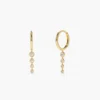Dangling sterling silver drop earrings with delicate diamond accents