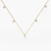 Sterling silver dangling solitaire necklace with five round stones