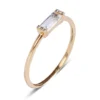 Baguette topaz ring with premium CZ diamond accents and gold plating