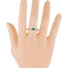 Sterling silver ring with 0.62-carat emerald and diamond details