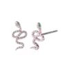 Gold-plated sterling silver snake studs with a refined motif