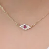 925 Sterling Silver evil eye necklace with a ruby-coloured centre and sparkling stones