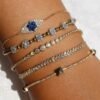 Gold-plated silver bracelet with baguette-set CZ diamond stones