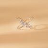 X-shaped cluster ring with intersecting bands and sparkle