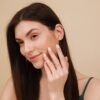 Modern cluster ring with a sculptural X silhouette