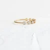 Minimal band ring featuring a continuous pave stone row