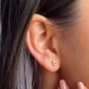 Small diamond earrings with a delicate, timeless silhouette