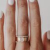 Contemporary solitaire ring with a distinctive Asscher cut stone