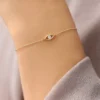 Bracelet with symbolic evil eye design and polished finish