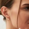 Diamond hoop earrings showing a 15MM inner diameter
