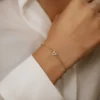 Curb bracelet featuring premium CZ diamond detailing and an initial charm