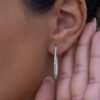 Gold-plated sterling silver hoop earrings with an elongated oval shape