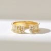 Open wedding band featuring Premium CZ Diamond accents and pave setting