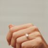 East-west oval ring highlighting a clean solitaire silhouette