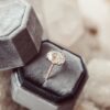Oval CZ diamond ring with refined pave setting