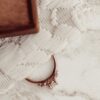 Oval ring design with thick gold plating and smooth silver finish