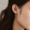 Gold-plated sterling silver earrings with a refined polished finish